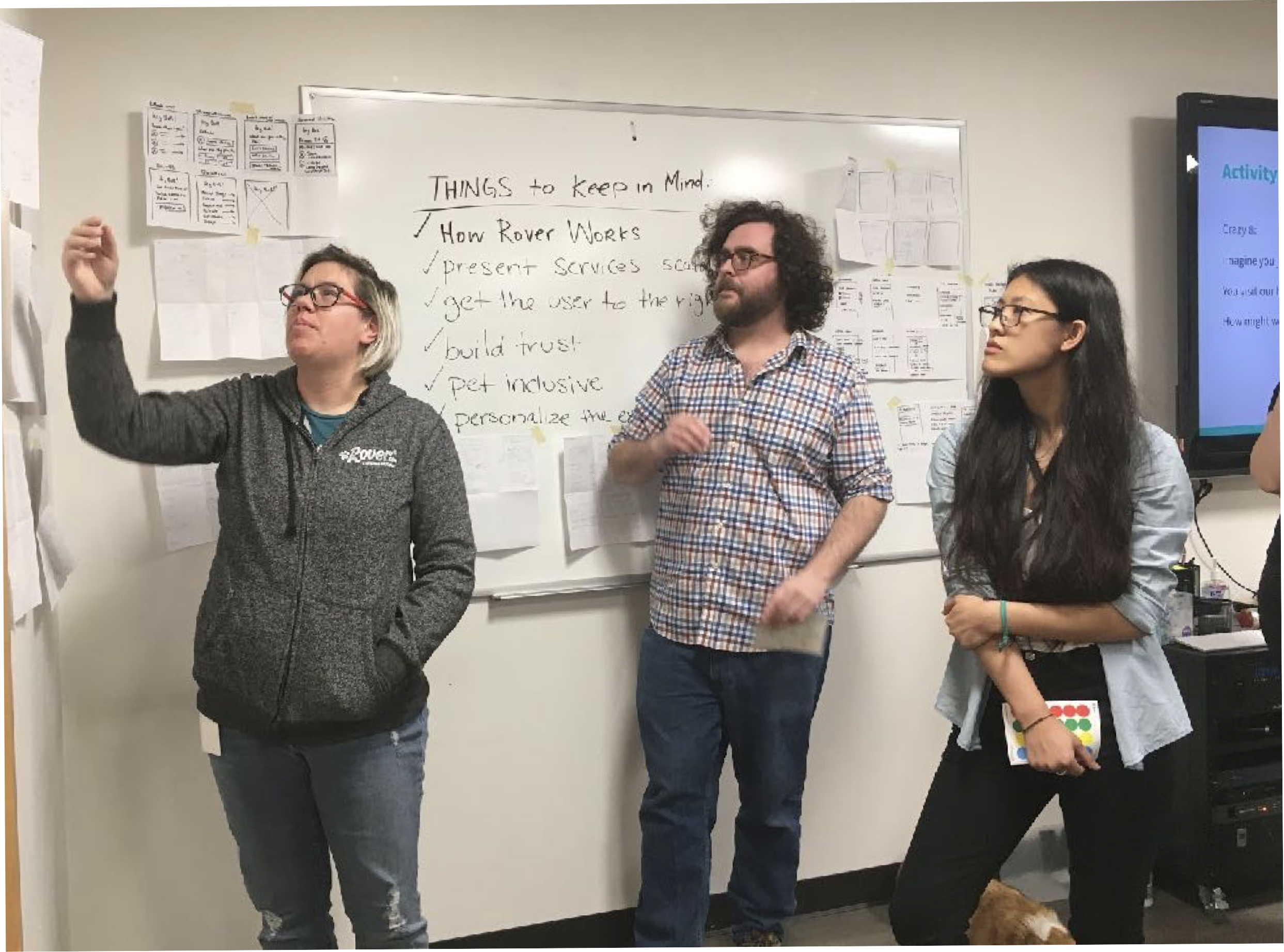 Product designers at Rover facilitating a collaborative design charrettes activity with cross-functional partners.